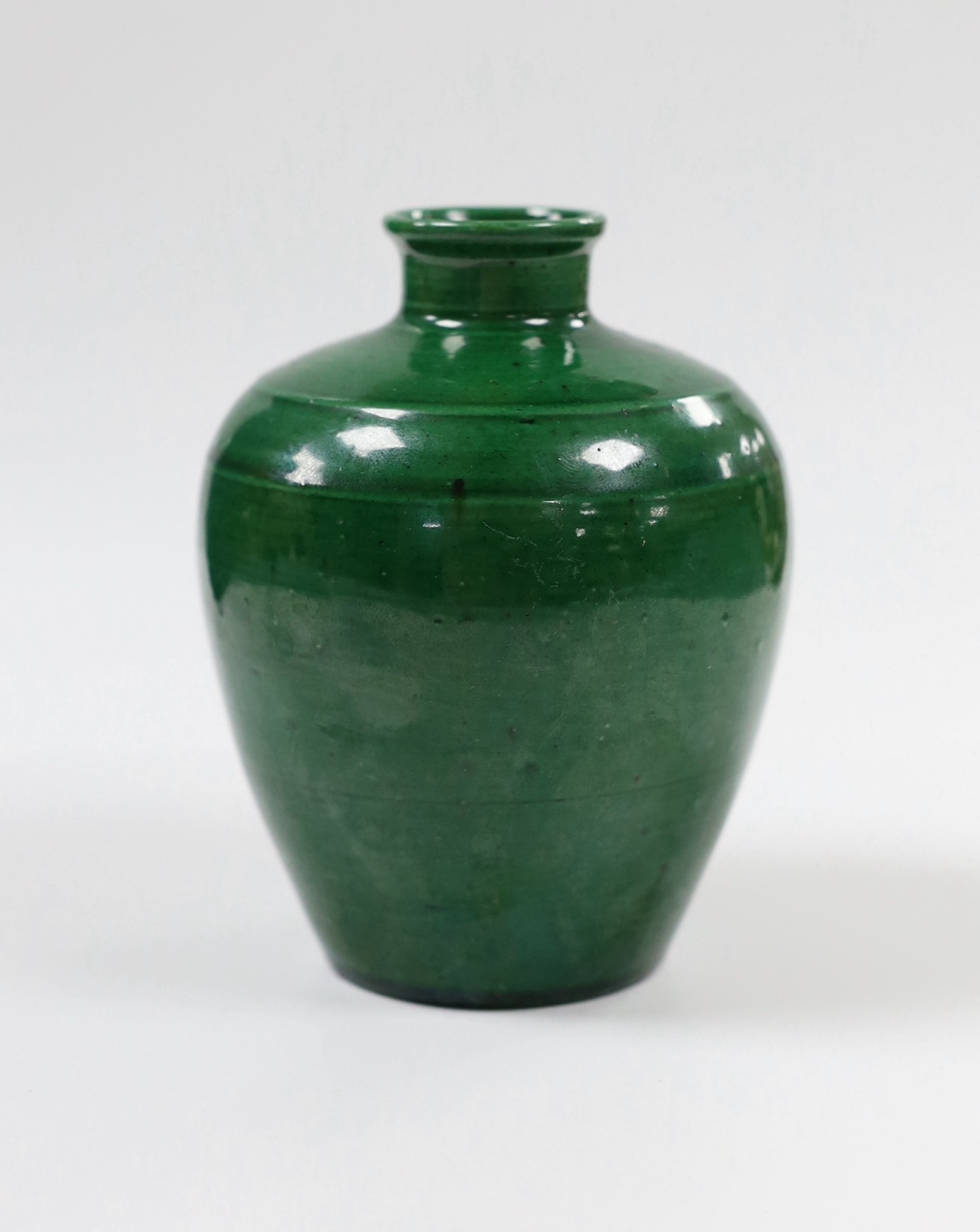 A Chinese green glazed vase, 11.5cm tall